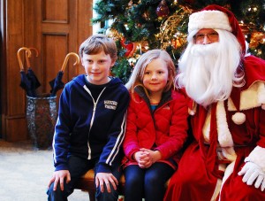 The Jolly Elf himself is on hand each Saturday in the lobby of the Fairhaven Village Inn to chat and pose for photos.