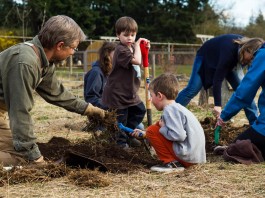 Common Threads Farm students work in the garden.
