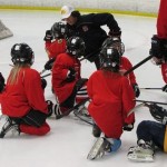 youth hockey team huddle