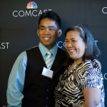 comcast students poses with parent
