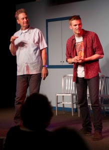 Ryan Stiles (L) creates a new scene on the spot with Tobias Childs (R) at the Upfront Theatre.