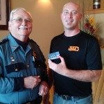 Brian Poag of Jake’s Western Grill and Lynden Police Chief Jack Foster