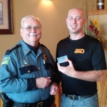 Lynden Police Chief Jack Foster and Brian Poag of Jake’s Western Grill