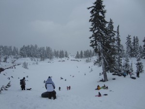 The sledding bowl at Mount Baker is a winter wonderland. The landmark chalet can be seen in the background.