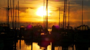 Semiahmoo Marina is surrounded on all sides by gorgeous water and mountain views. Stunning sunsets abound. Photo courtesy: Semiahmoo Marina.