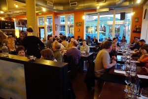 Restaurant-goers give EAT their seal of approval, filling the restaurant's dining room during a recent beer and wine event. Photo credit: Sharon Beth Photography.