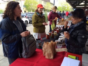 Doniki Boderick-Luckey (left) calls kimchi her “soul food." She was thrilled to find Sujins Kimchi at the Bellingham Farmers Market. 