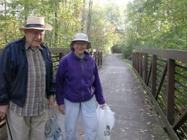 couple picking up trash