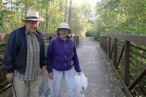 couple picking up trash