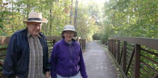 couple picking up trash