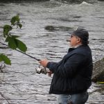 man-fish-fishing-cigar
