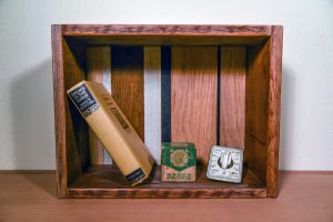 This beautiful shadowbox shelf was made from materials that otherwise might have ended up in a landfill. Photo Courtesy: The RE Store.