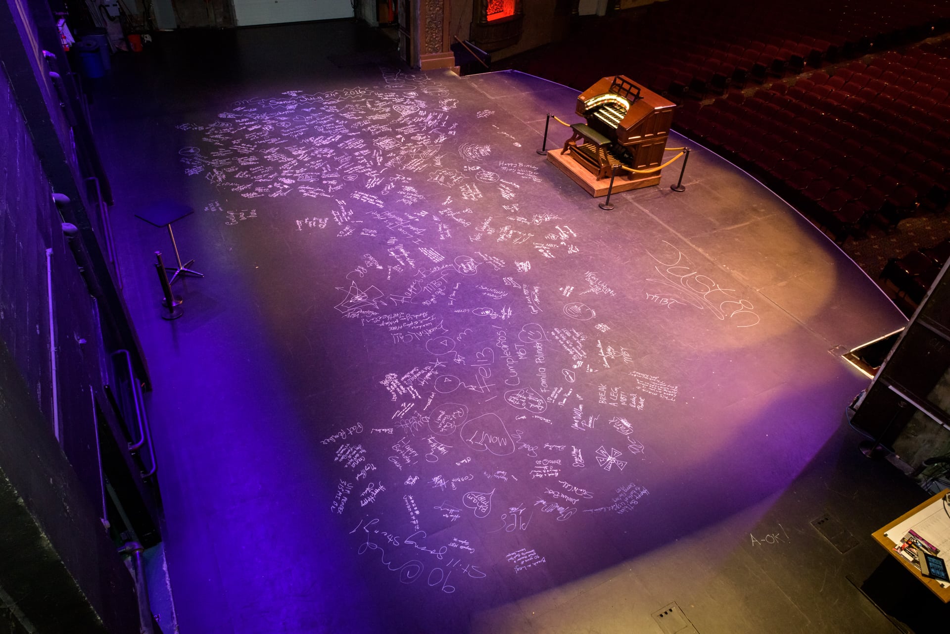 The historic stage at the Mount Baker Theatre was recently covered by patrons' signatures. Photo courtesy: Mount Baker Theatre.