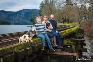 Mark Turner took this family portrait on the abandoned railroad trestle at the south end of Lake Whatcom. The family lives just up Blue Canyon Road and chose this location for the meaning it has to them. Photo credit: Mark Turner.