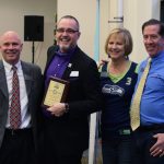 Right to left, Scott Hume of Salish Wealth Management and the event emcee; Kevin Coleman; Kathy Cross and Randy Cross of LaserPoint Awards.