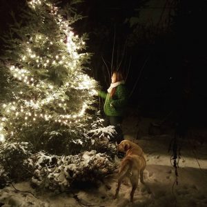 Molly Greenleaf captured this festive moment of her sister and her dog. Photo credit: Molly Greenleaf.