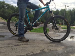 This mountain biker is ready to hit the pump track. Photo credit: Taylor Bailey.