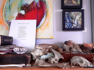 Canyon's collection of skulls inspires her paintings. She also writes poems and fiction. Photo credit: Patricia Herlevi.