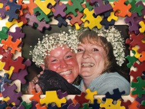 Jody Guenser and Pam Sinnett pictured in 2000 at a fund raiser before the end of another successful school year. Photo credit: Dondi Tondro-Smith.