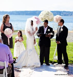 Marry Me Wedding Ceremonies creates a meaningful ceremony for anyone chosen by the family to officiate. Photo courtesy: Marry Me Wedding Ceremonies.