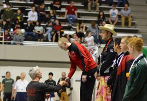 Brisen receiving his medal after winning the 50 free. Photo credit: Grant Clark.