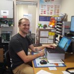 Solar in Whatcom County Dana at desk