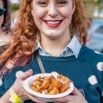 industrial-credit-union-food-truck-round-up-woman-with-food