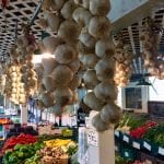 joes-gardens-garlic-braids-hanging-farmstand