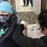 patient receives vaccine