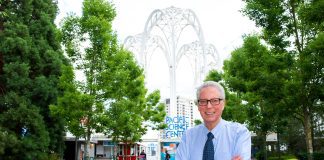Dennis Schatz stands in front of the Pacific Science Center where he was a long-term staff member. Photo courtesy SPARK Museum