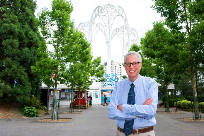 Dennis Schatz stands in front of the Pacific Science Center where he was a long-term staff member. Photo courtesy SPARK Museum