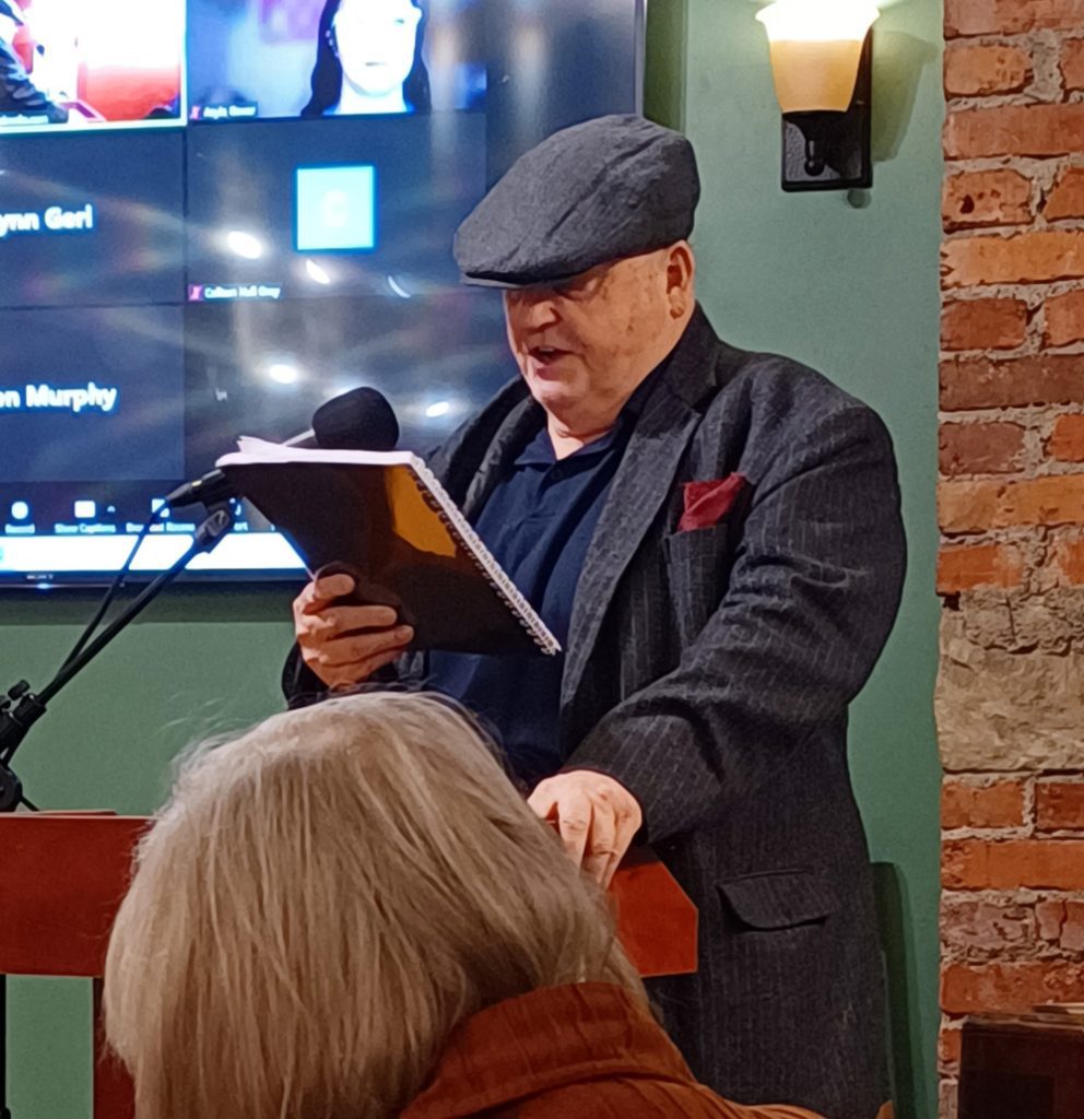 Thomas Prosser reads at a recent Village Books Open Mic. Photo credit: Kristin Noreen
